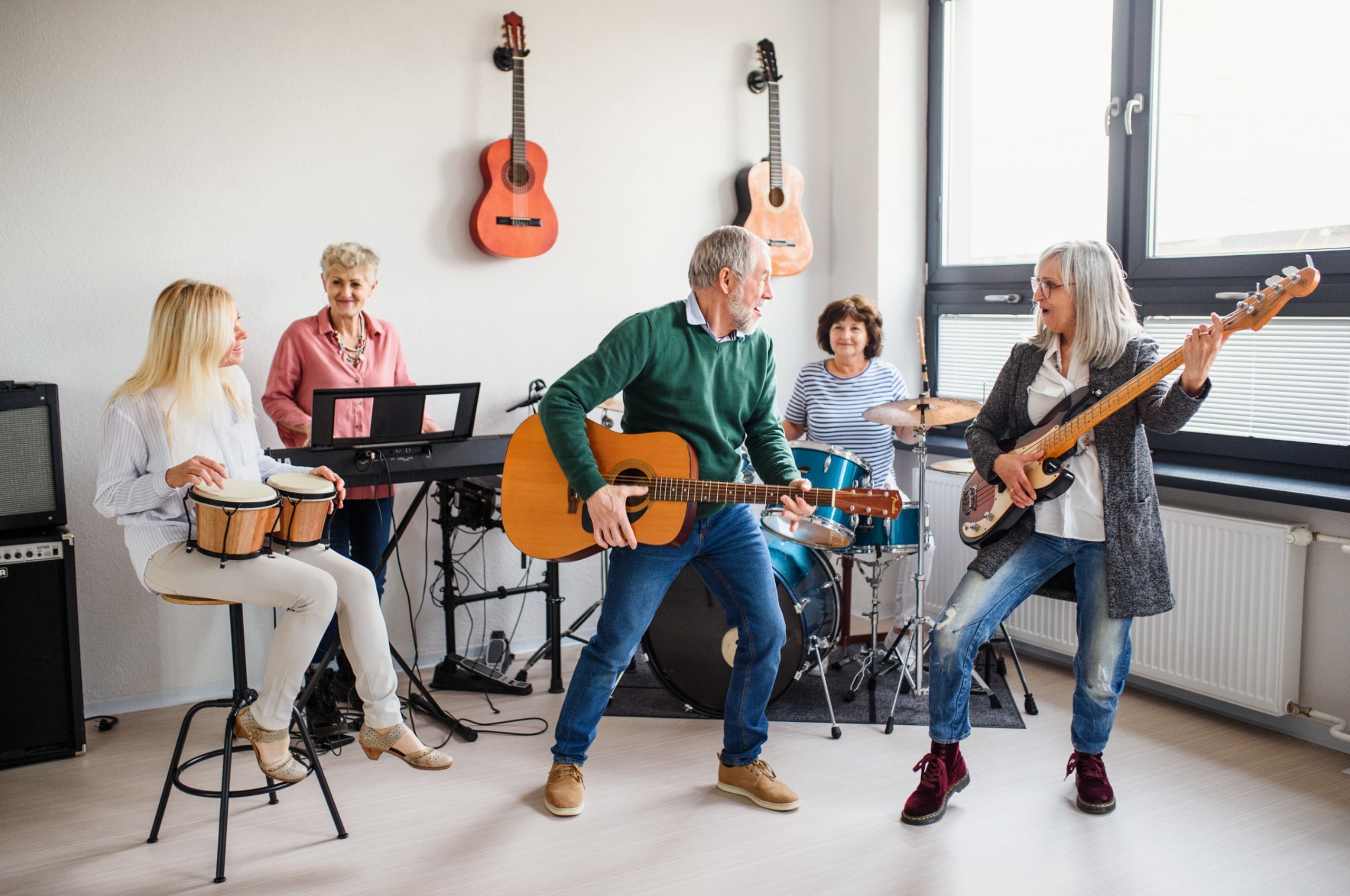 A group of people playing instruments.